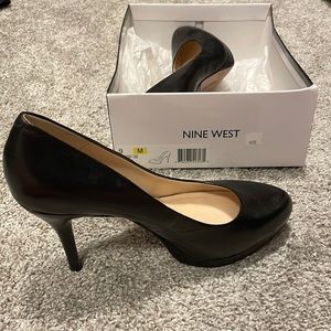Womens Nine West black heel, 3 inch. Size 9.